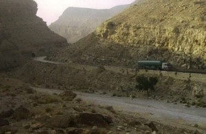 Oil tanker carrying fuel to US forces in Afghanistan via the Bolan Pass just south of the city of Quetta in Balochistan, Pakistan. Photo by Merrill Findlay, 2006.